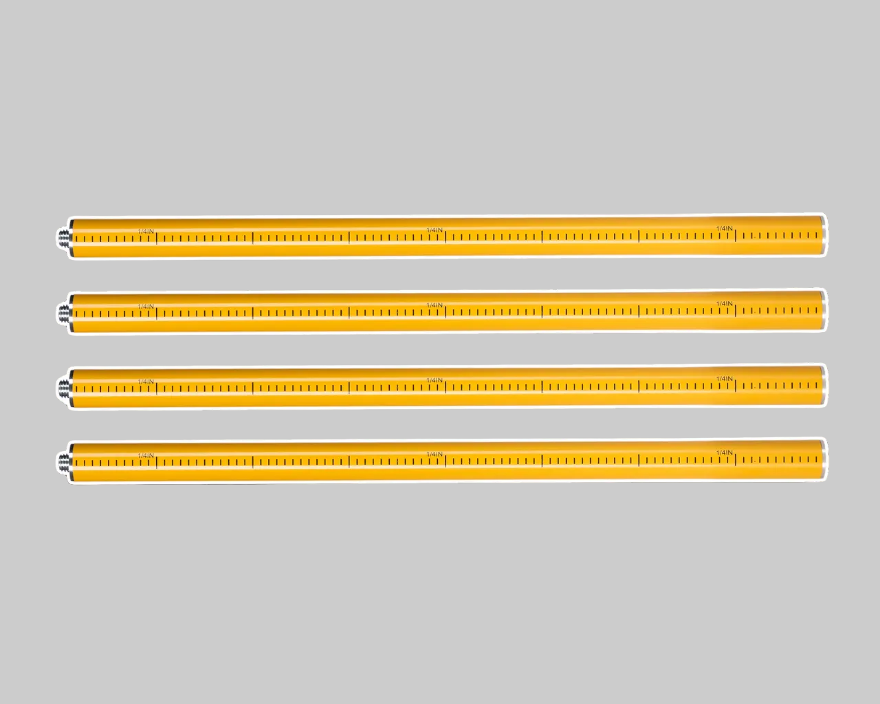 Four yellow metal brackets on a dark gray background