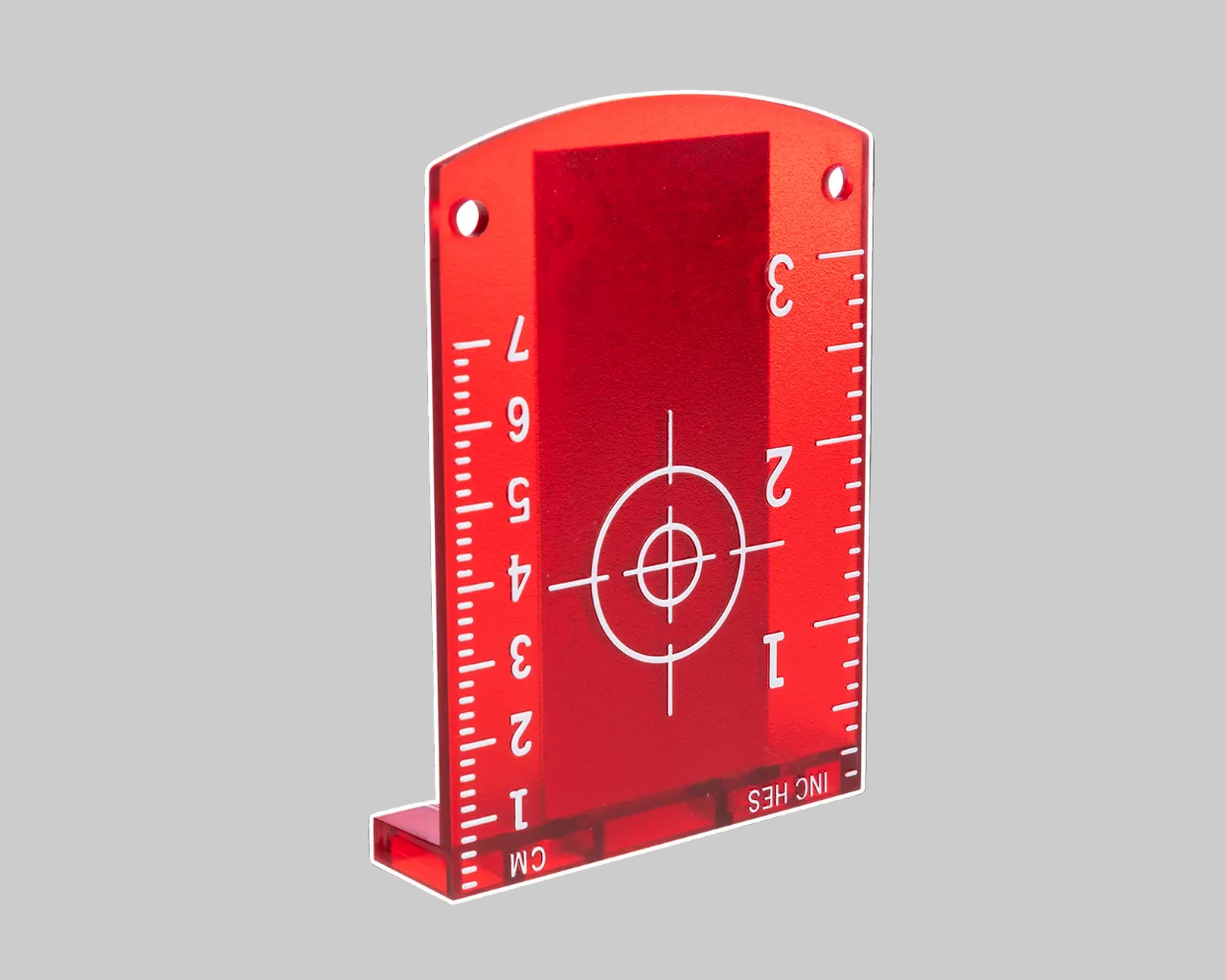 Red level tool with measurement scale and target symbol on a dark background