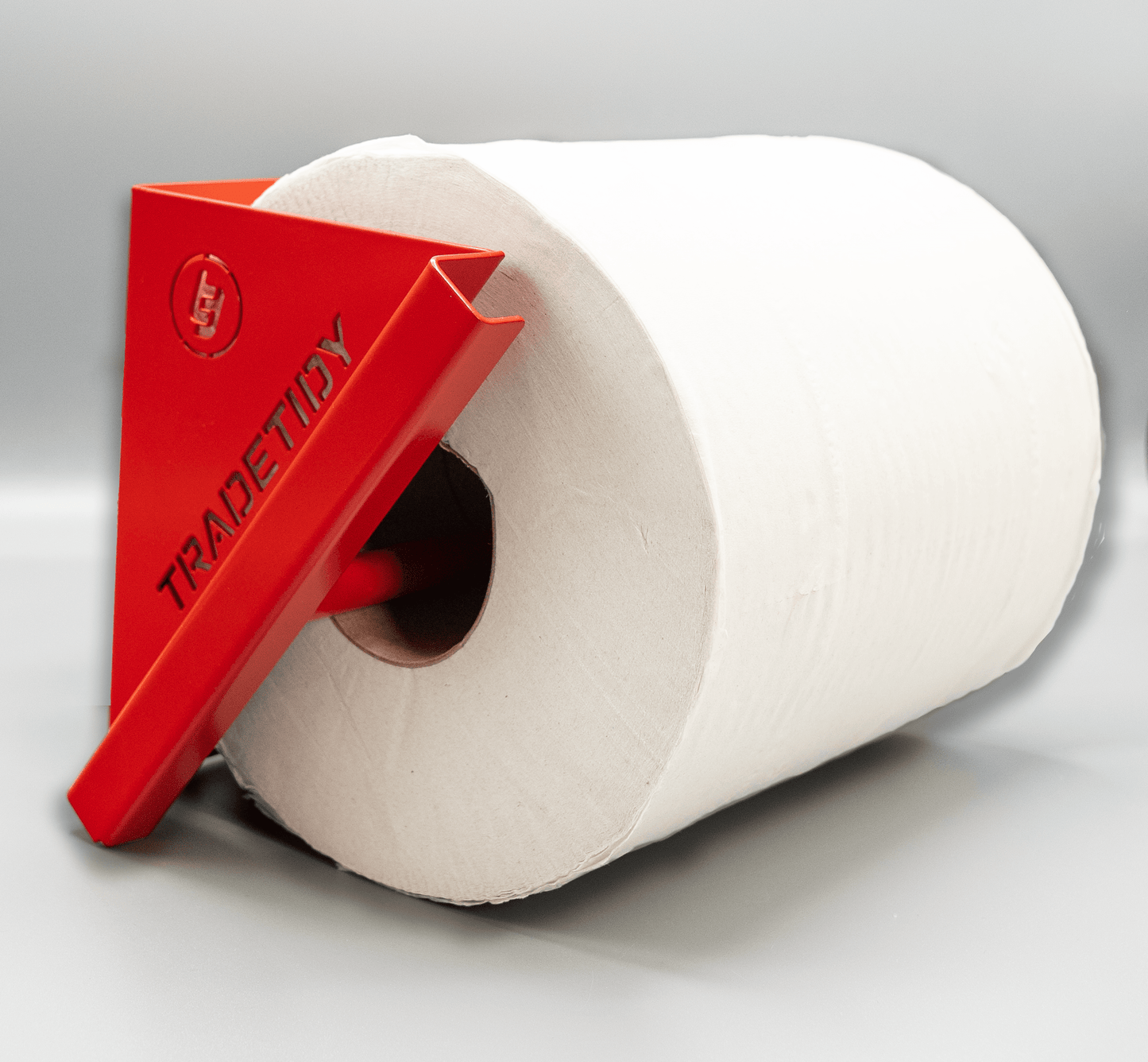 Tissue in a Red Tissue Holder on a Gray Background